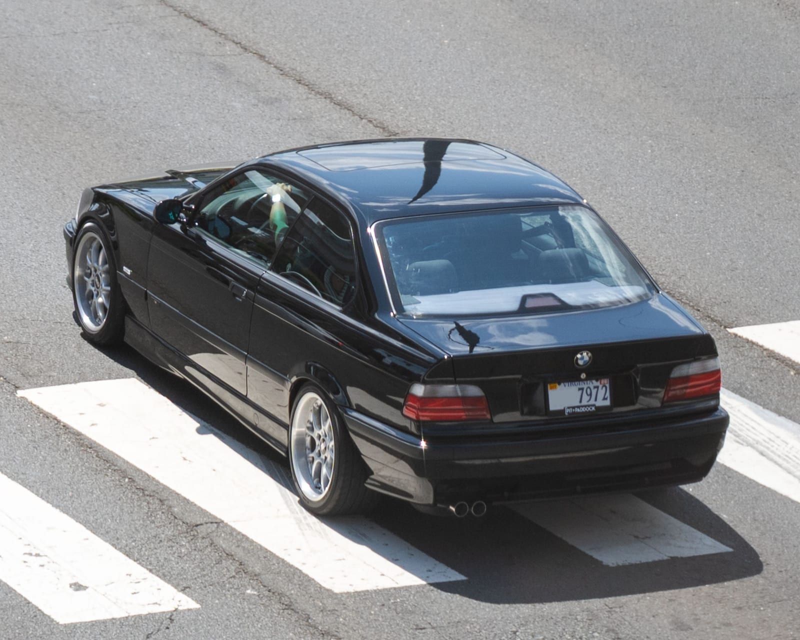 Black BMW E36 328i coupe seen from above