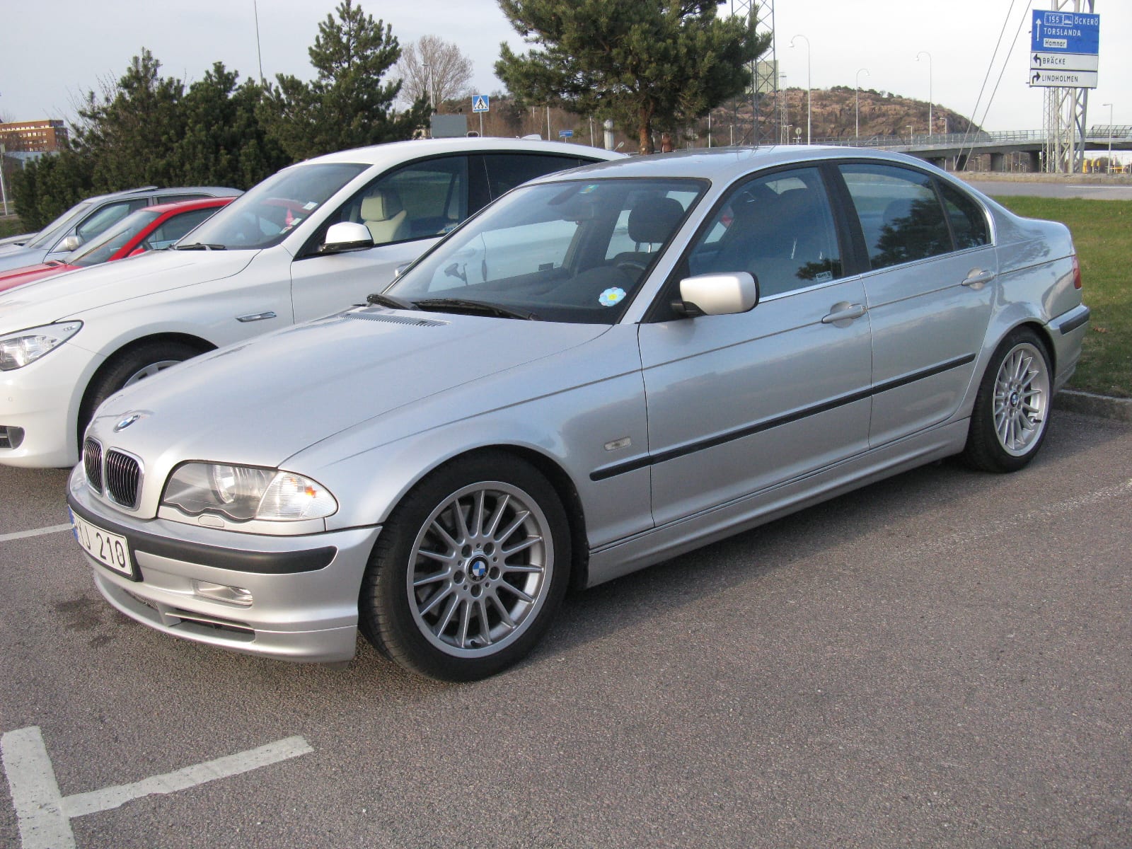 BMW E46 330i sedan parked outdoors