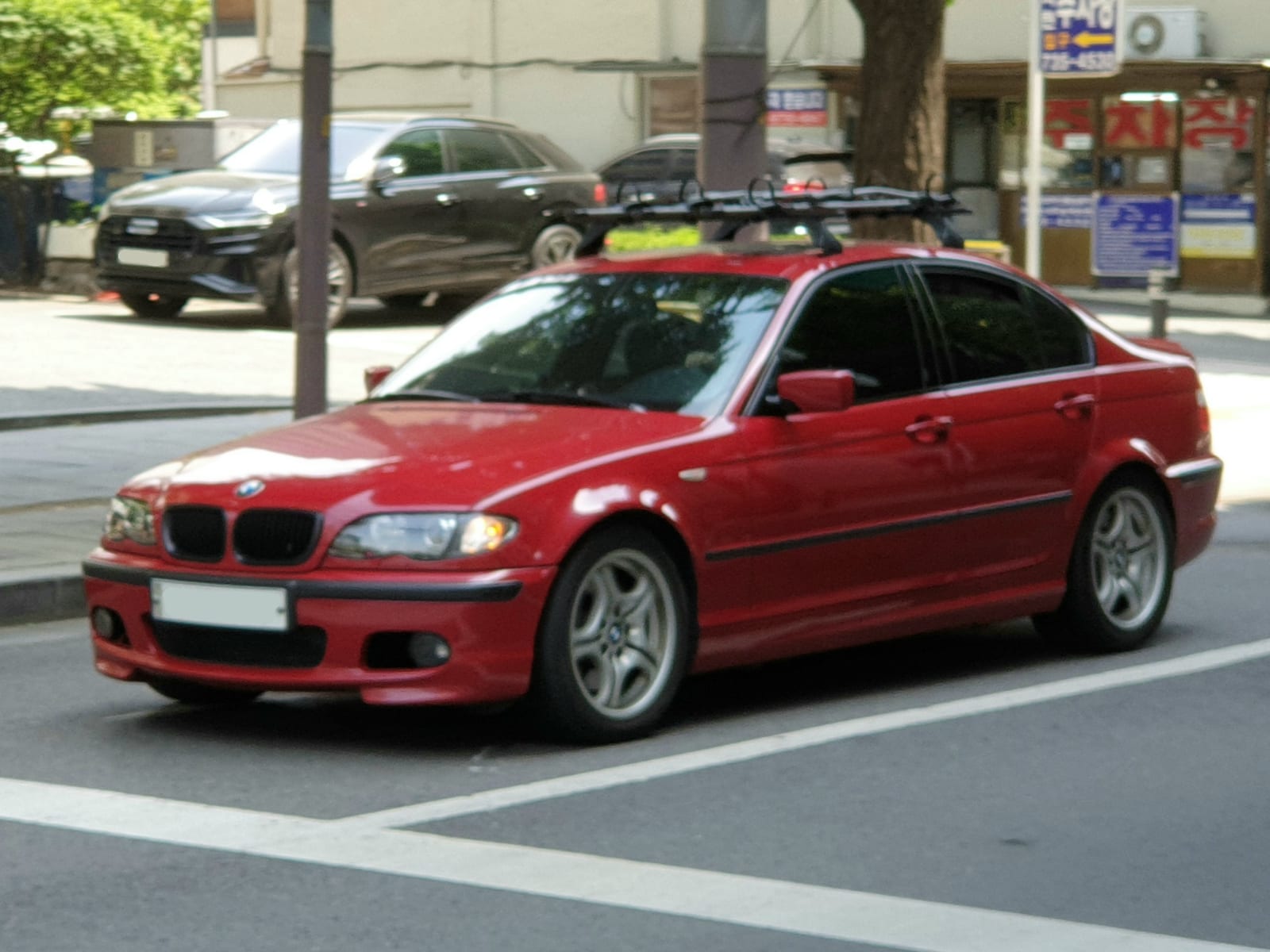 Red BMW E46 330i M Sport sedan