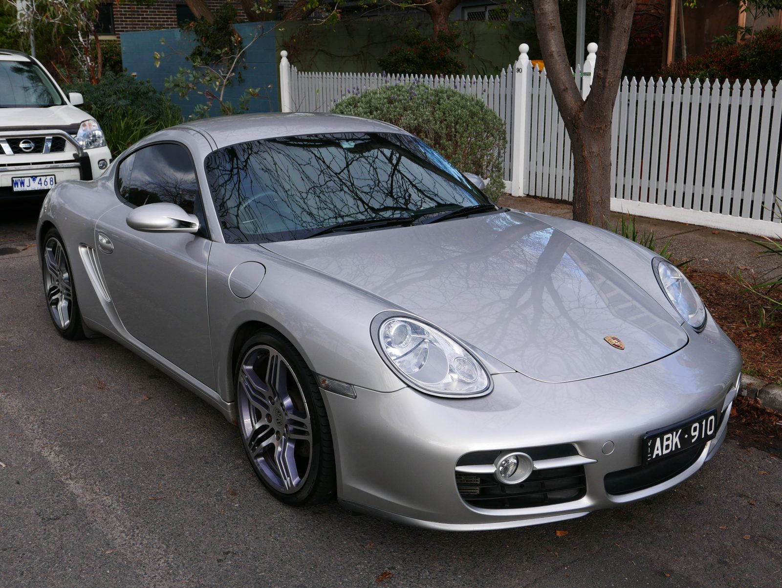 Silver Porsche Cayman S (987), front three-quarter view